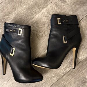 Guess Black Leather High-Heel Ankle Boots with Gold Hardware